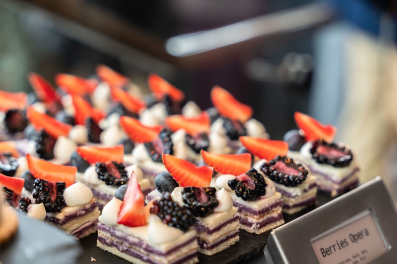 Berries opera cake with strawberries and blackberries